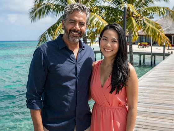 David from Canada and Ploy from Thailand happy couple on pier success story