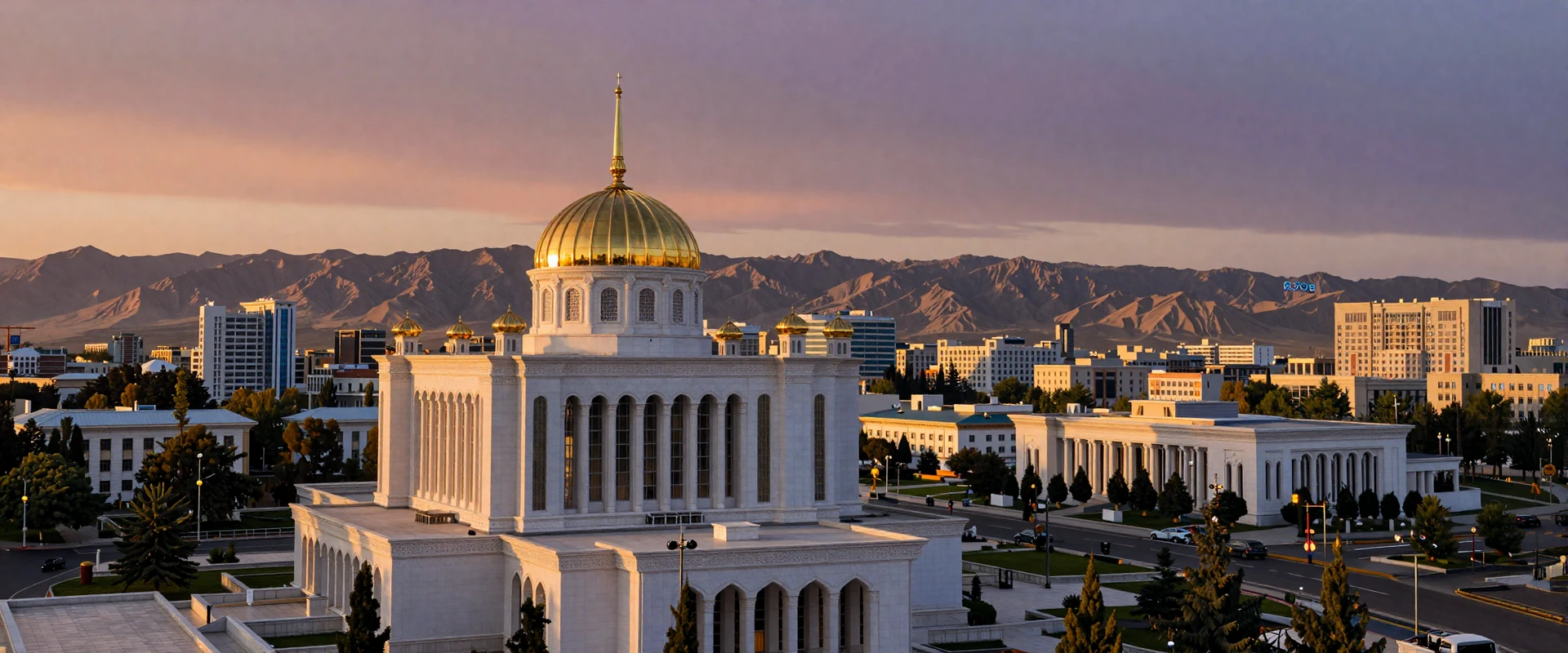 Ashgabat Turkmenistan white marble cityscape at golden hour with Kopet Dag mountains and ornate government buildings